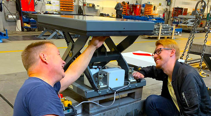 Fredrik Johansson (R), project manager, examines the prototype for the new M0