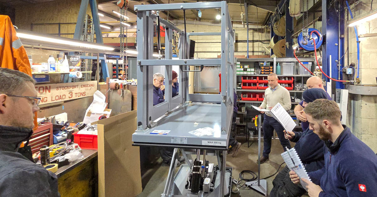 Group walkthrough of service and troubleshooting directly on the lift table.